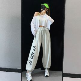 بنطلون رياضي عالي الخصر برباط على شكل فيونكة وأساور مطاطية مكشكشة للنساء