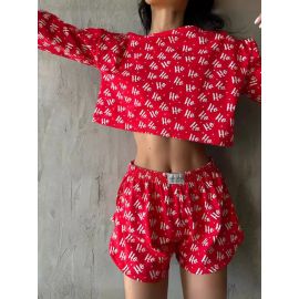 طقم بيجامة قصيرة برقبة دائرية وأكمام طويلة مع خصر مطاطي وفتحات صغيرة جانبية على البنطال للنساء