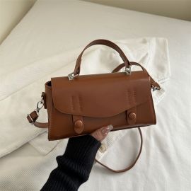 شنطة نسائي بتصميم رسمي