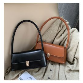 شنطة نسائي ذات لون ساده