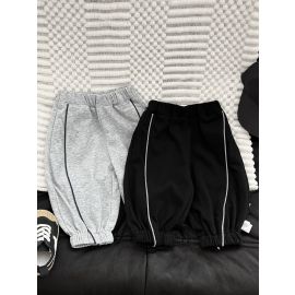 بنطال رياضي واسع بخصر مطاطي، بتصميم كاجوال للجنسين، مصنوع من قماش ناعم ، مع خطوط عاكسة جانبية 