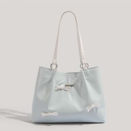 شنطة نسائي مزينه بفيونكات صغيره