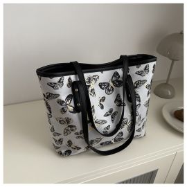 حقيبه كتف للسيدات مزينه برسومات فراشه