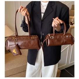 شنطة نسائي مزينه بحزام