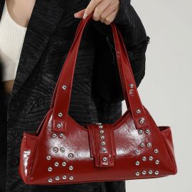 حقيبة نسائي مع حزام عريض مرصع بمسامير فضية