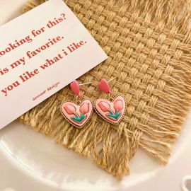 اقراط نسائي بنمط قلب