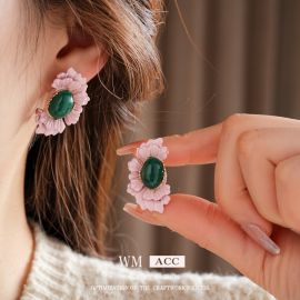 أقراط عتيقة الطراز بإبر فضية، بتصميم زهرة بيضاوية