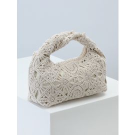 شنطة يد نسائية بتصميم حياكة