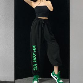 بنطلون رياضي عالي الخصر برباط على شكل فيونكة وأساور مطاطية مكشكشة للنساء