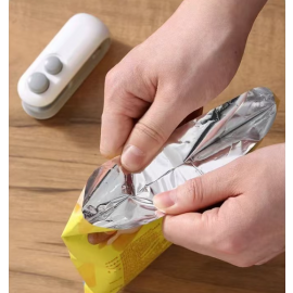 آلة ختم يدوية منزلية صغيرة محمولة لإغلاق الأكياس البلاستيكية والوجبات الخفيفة