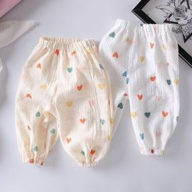 بنطلون قطني للأطفال بتصميم واسع وفضفاض، مطبوع عليه قلوب ملونة بتصميم خصر مطاطي