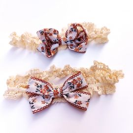 ربطة شعر بفيونكة وحواف قطنية مرنه مطرزة بالدانتيل للفتيات / قطعتين 