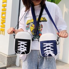 شنطه نسائي صغيره الجحم مزينه باربطة