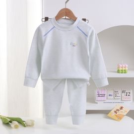 طقم بيجامة بأكمام ورقبة دائرية وبنطال طويل بألوان سادة للاطفال