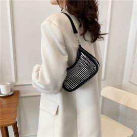 شنطة يد نسائي مطرزه