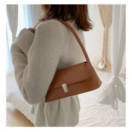 شنطة نسائي ذات لون ساده
