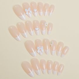 اظافر صناعية طويلة مزينه برسومات بيضاء ناعمه