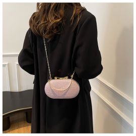 شنطة يد نسائي سهرة بيضاوية الشكل