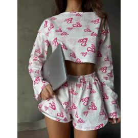 طقم بيجامة قصيرة برقبة دائرية وأكمام طويلة مع خصر مطاطي وفتحات صغيرة جانبية على البنطال للنساء