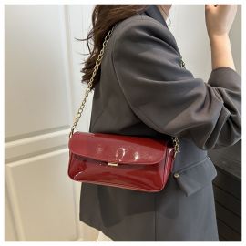 شنطة نسائي لامعه مزينه بسلسلة