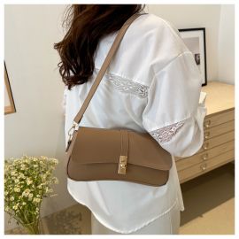 شنطة كتف نسائي ذات لون موحد