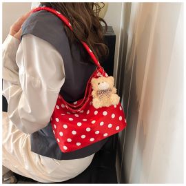 شنطة نسائي بتصميم منقط