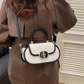 شنطة يد نسائي بيضاوية الشكل 