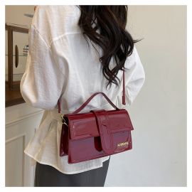 شنطة نسائي بجلد لامع