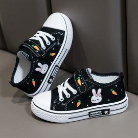 حذاء رياضي برباط ولاصق أمامي وبطبعات كرتونية للفتيات