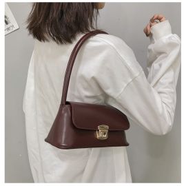 شنطه نسائي مزينه بقفل مطوي