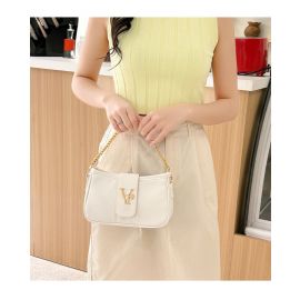 شنطه نسائي مزينه بحزام ذهبي