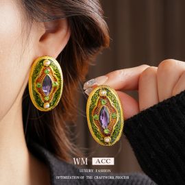 أقراط بيضاوية من اللؤلؤ