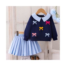 سويت شيرت بأكمام طويلة وطبعة فيونكة باللون الأزرق الملكي مع تنورة قصيرة