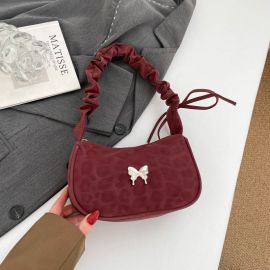 شنطه نسائي مزينه بفراشه