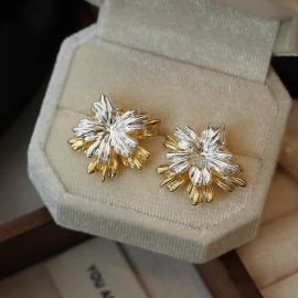 اقراط نسائيه على شكل زهره مدمجه الون الذهبي والفضي