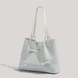 شنطة نسائي مزينه بفيونكات صغيره